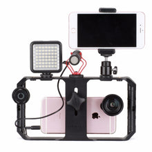 Load image into Gallery viewer, Smartphone Video Rig Stabilizer With Light
