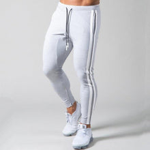 Load image into Gallery viewer, Slim-fit banded joggers
