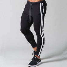 Load image into Gallery viewer, Slim-fit banded joggers
