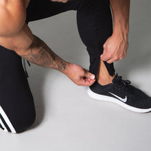 Load image into Gallery viewer, Slim-fit banded joggers
